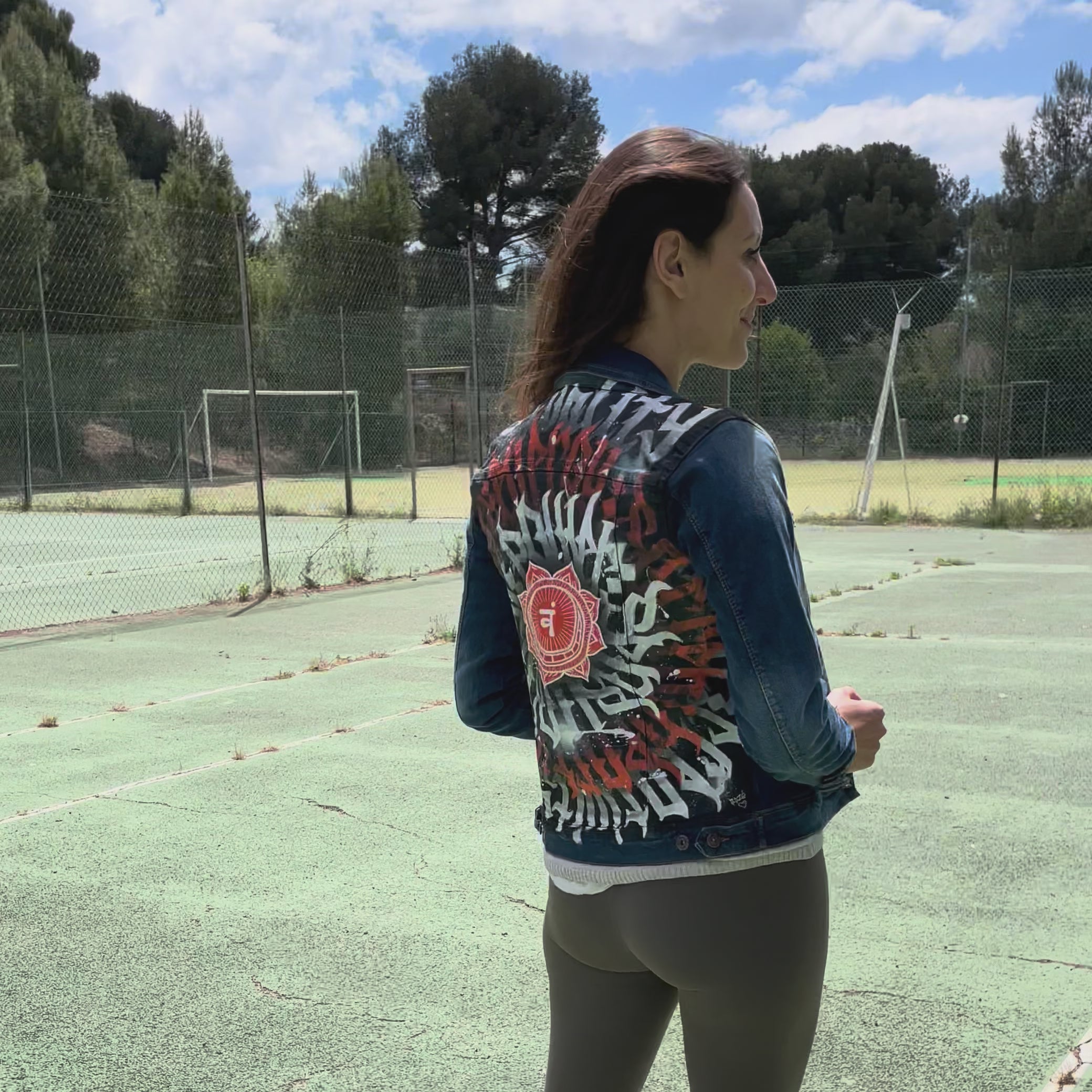 Hand-painted denim jacket by Niçois artist Razé, featuring calligraffiti inspired by Nice, spirituality and combat sports. Unique wearable artwork, some pieces ritually blessed by a shaman or priest.
